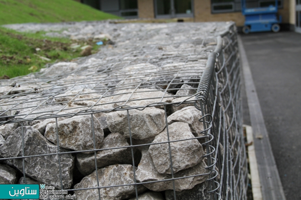 گابیون , کاربرد گابیون , عملکرد گابیون , Gabion , Gabions , A gabion , دیوار گابیون , concrete scraps , wire cage , دیوار تور سنگ , تور سنگی , دیوار تور و سنگ