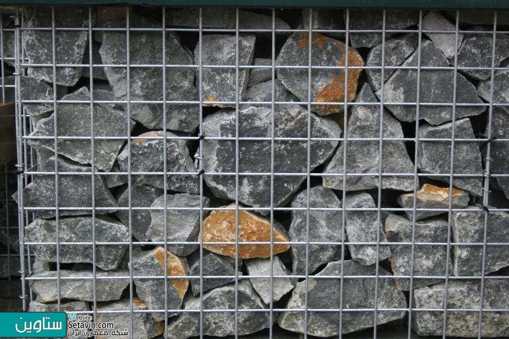 گابیون , کاربرد گابیون , عملکرد گابیون , Gabion , Gabions , A gabion , دیوار گابیون , concrete scraps , wire cage , دیوار تور سنگ , تور سنگی , دیوار تور و سنگ