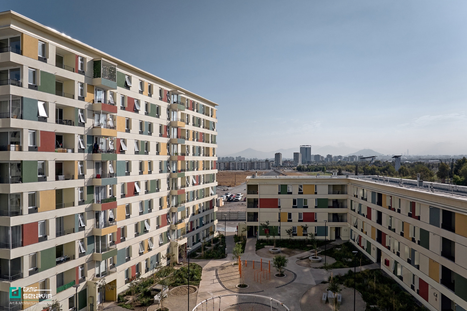 English: Mirador Laguna, High-Rise Architecture, Vertical Living, Social Housing Chile, Sustainable Design, Urban Density, Contemporary Residential Architecture, Community Integration ,میرادور لاگونا، معماری بلندمرتبه، زندگی اجتماعی عمودی، معماری شیلی، طراحی پایدار، تراکم شهری، معماری مسکونی معاصر، مجتمع مسکونی اجتماعی