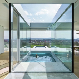 تصویر - خانه شیشه ای بر فراز دره ای سرسبز ، اثر تیم معماری Paul de Ruiter ، آلمان - معماری