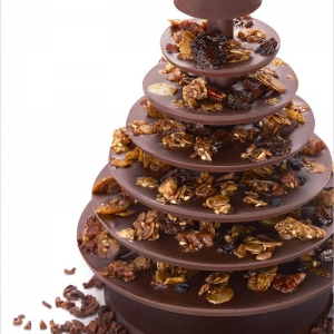 تصویر - درخت کریسمس شکلاتی در یک بسته بندی مسطح - معماری